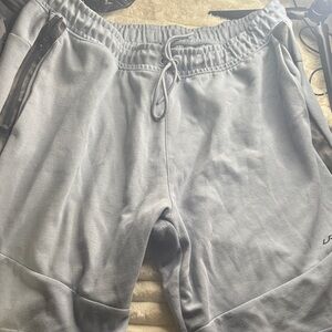 UA Men's Athletic Shorts in Light Gray